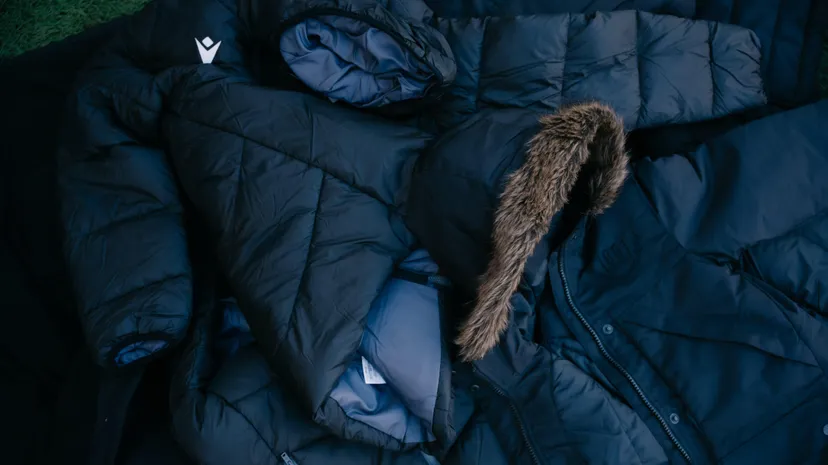 Doneer je oude winterjas voor Club-Charleroi